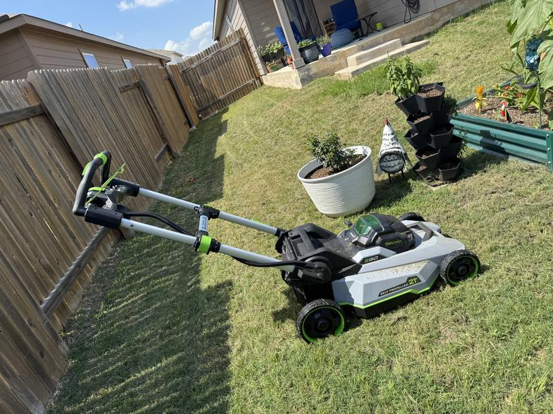 Handle extended, ready to mow the side yard